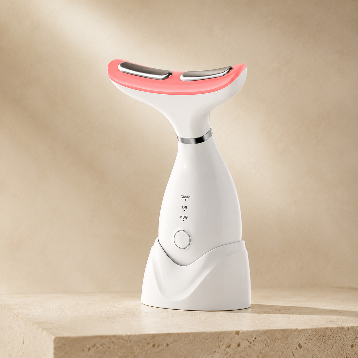 CALUNE LumaWave 7-in-1 face and neck massager on ivory travertine